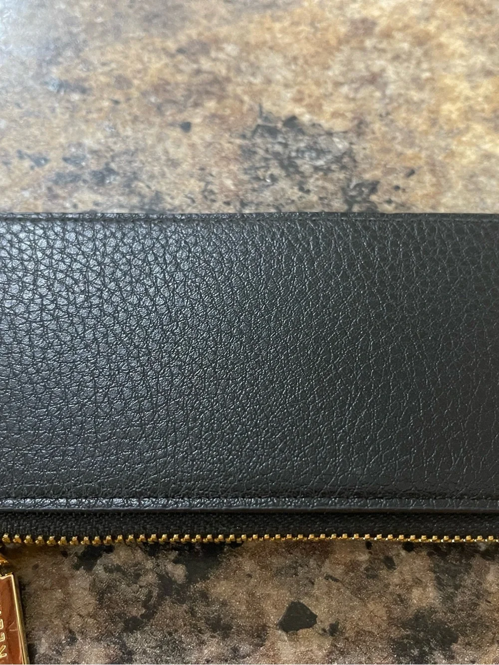 Anne Klein black pebble leather zip wristlet with gold hardware